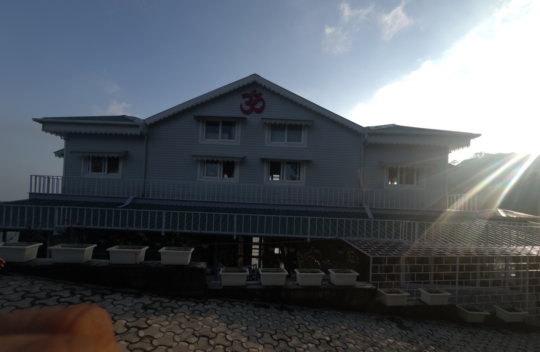 Client-supplied photograph of a property building at the actual site